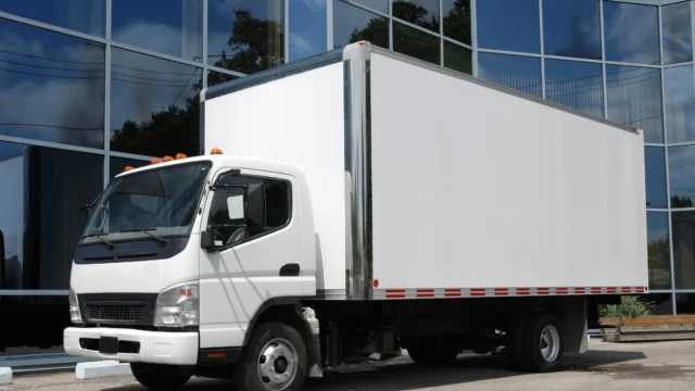 Commercial vehicle title pawn box truck parked outside